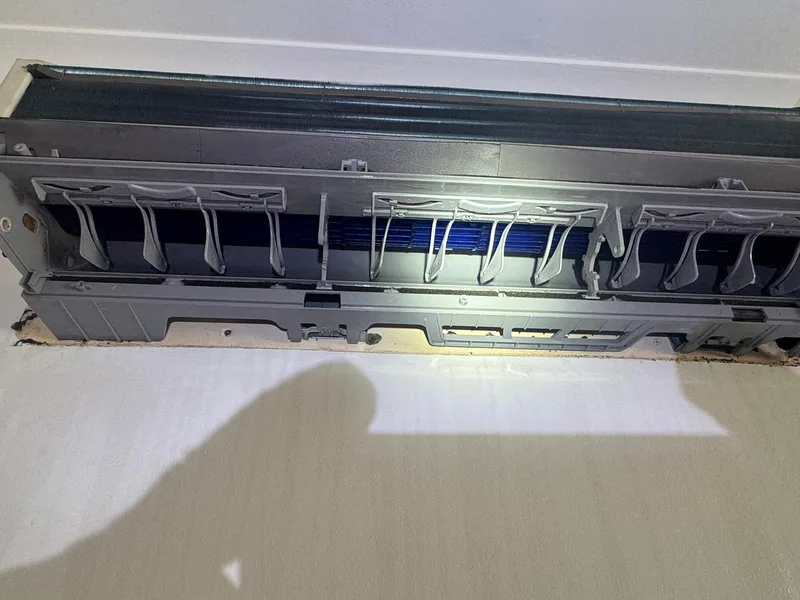 Indoor split-system coil and air outlet after cleaning
